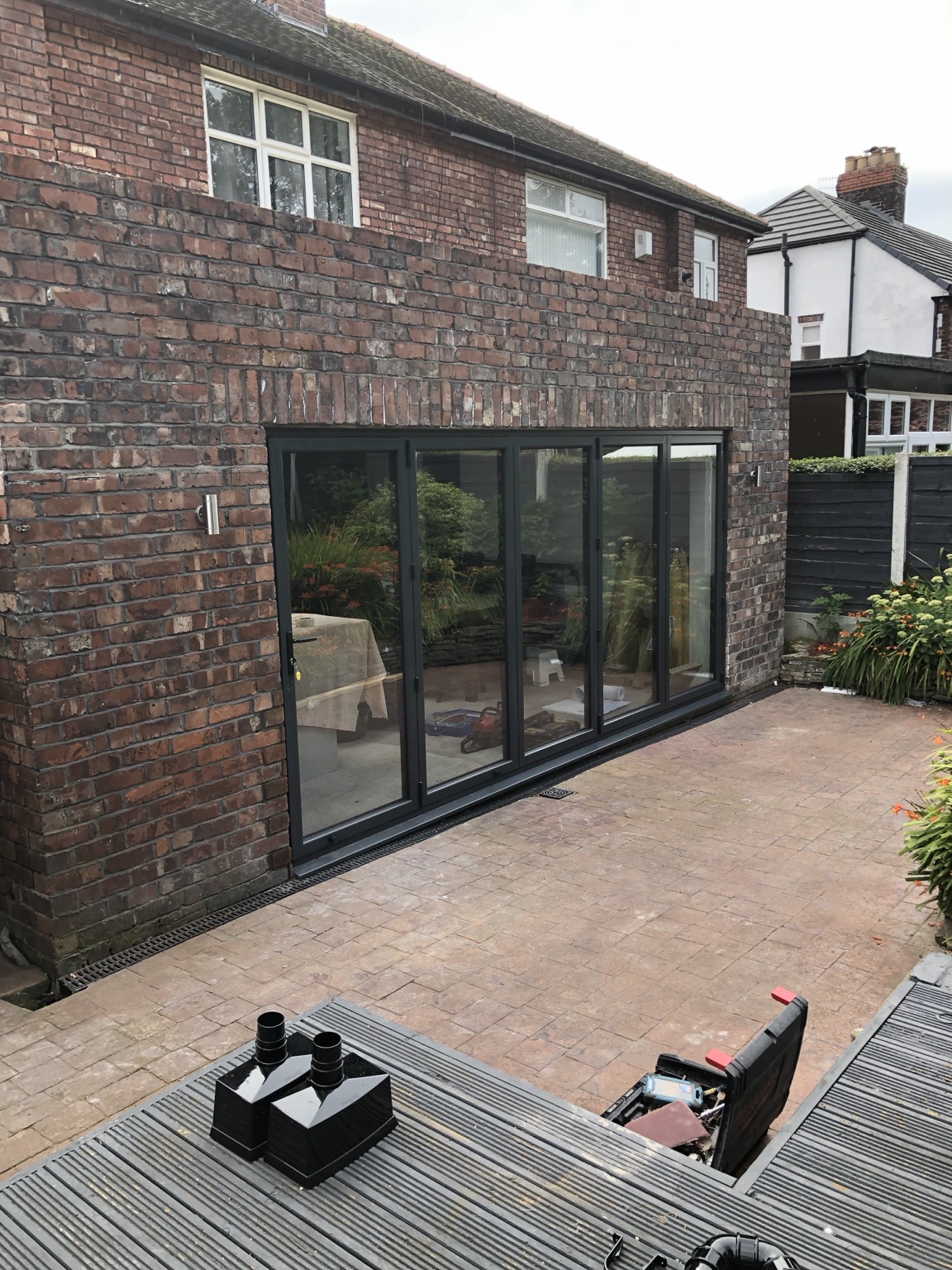Brickwork and wide glazed doors