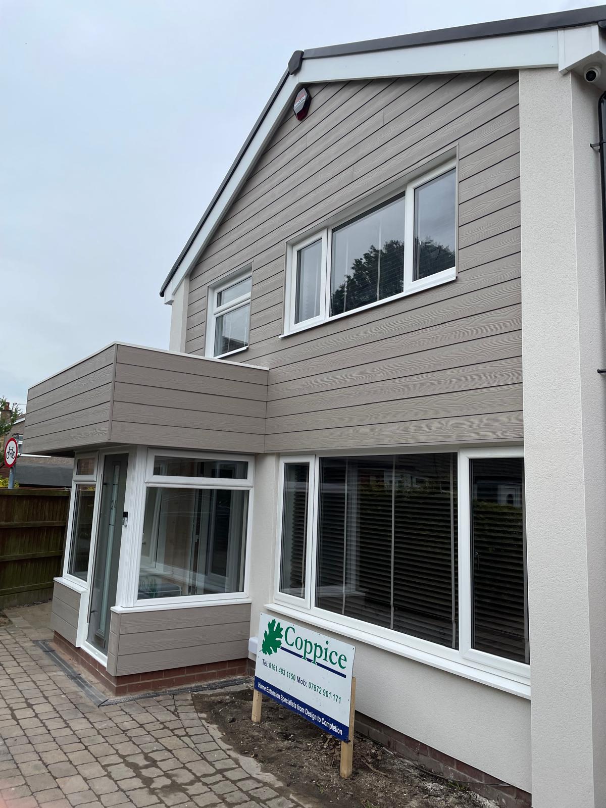 Cladding and window details around the entrance