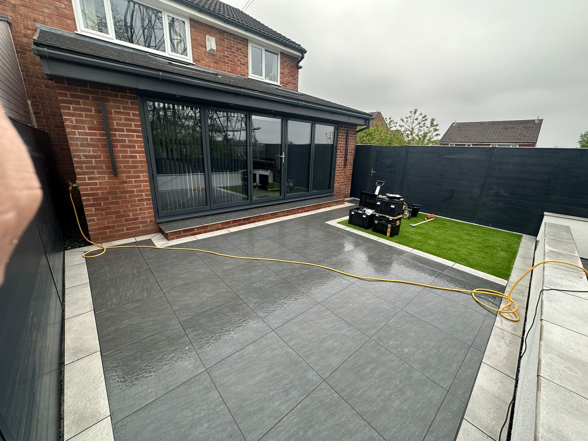 Daytime view of the extension and paved patio