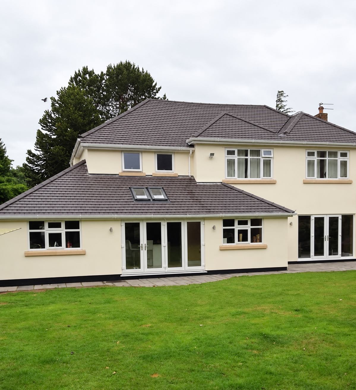 Traditional rooflines and a rendered finish